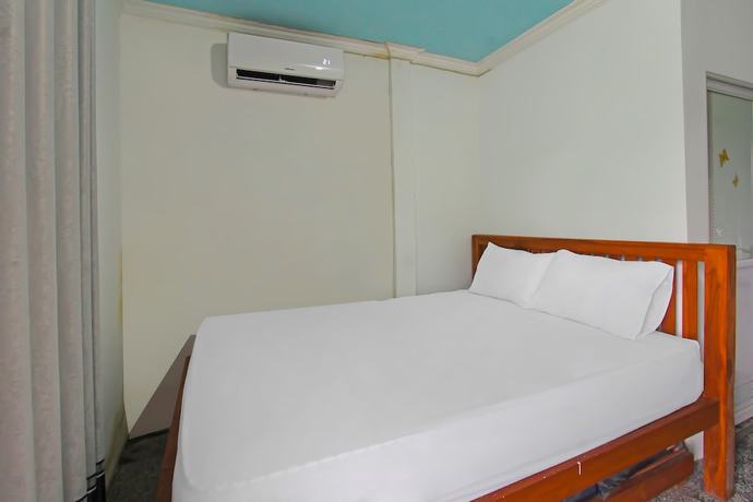 Imagen de la habitación del Hotel OYO 92558 Bale Datu Homestay. Foto 6