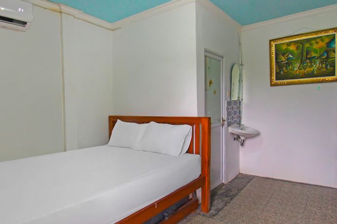 Imagen de la habitación del Hotel OYO 92558 Bale Datu Homestay. Foto 11