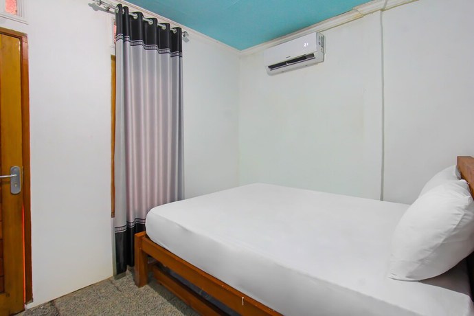 Imagen de la habitación del Hotel OYO 92558 Bale Datu Homestay. Foto 13