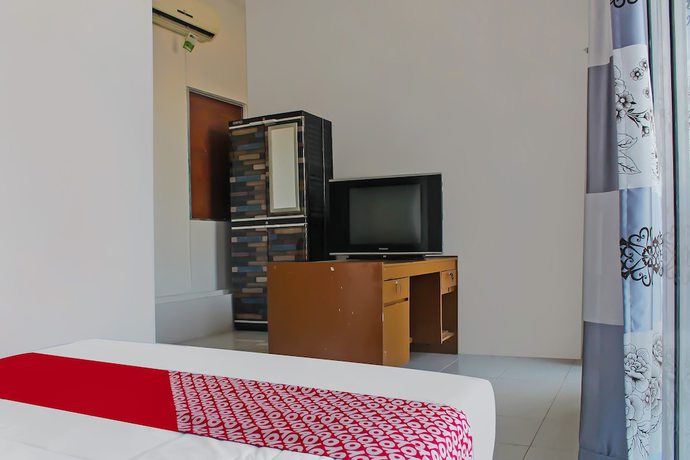 Imagen de la habitación del Hotel OYO 92593 Penginapan Sultan Haji 1. Foto 9