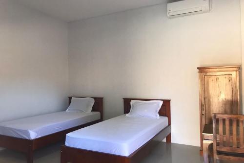 Imagen de la habitación del Hotel OYO 92603 Lidya Homestay. Foto 19