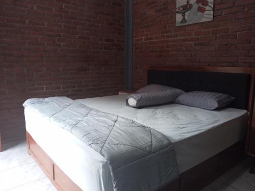 Imagen de la habitación del Hotel OYO 92606 Djoglo Boto Homestay. Foto 19