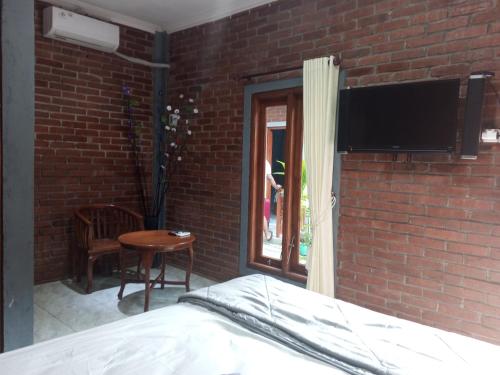 Imagen general del Hotel OYO 92606 Djoglo Boto Homestay. Foto 15