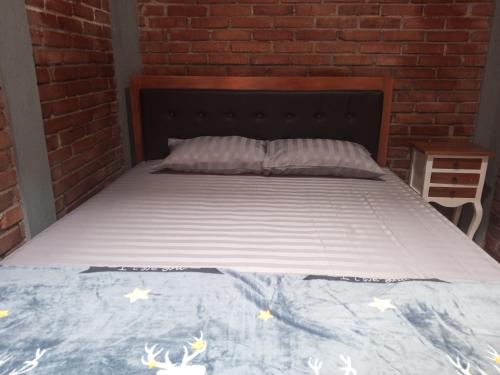 Imagen de la habitación del Hotel OYO 92606 Djoglo Boto Homestay. Foto 20