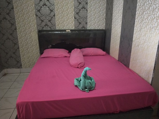 Imagen de la habitación del Hotel OYO 92618 Mareje Sariguna. Foto 2