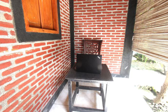 Imagen de los interiores del Hotel OYO 92618 Mareje Sariguna. Foto 12
