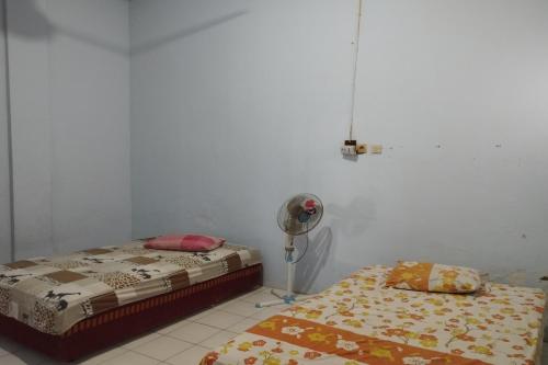 Imagen de la habitación del Hotel OYO 92618 Mareje Sariguna. Foto 20