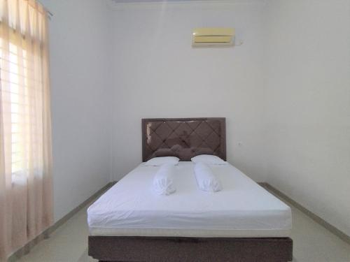 Imagen general del Hotel OYO 92637 Kost Arya Exclusive. Foto 16