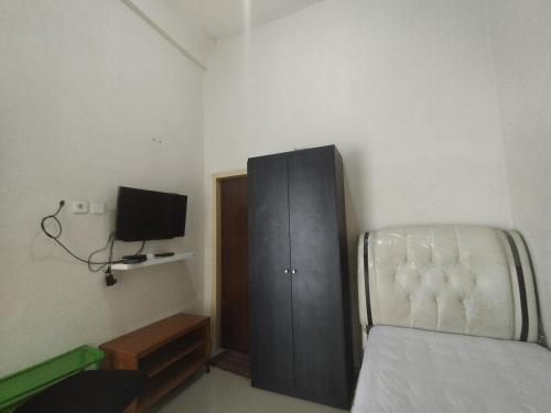 Imagen general del Hotel OYO 92637 Kost Arya Exclusive. Foto 18