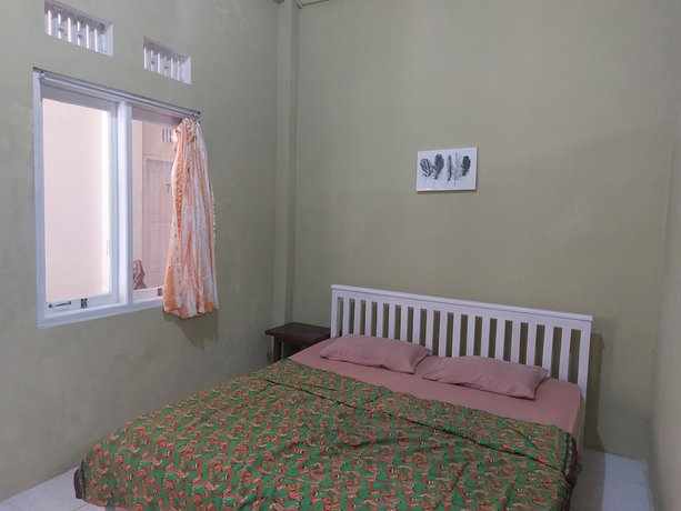Imagen de la habitación del Hotel OYO 92644 Onong\'s Homestay. Foto 11