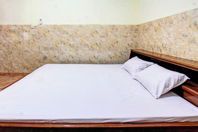 Imagen de la habitación del Hotel OYO 92655 Gian Homestay. Foto 2