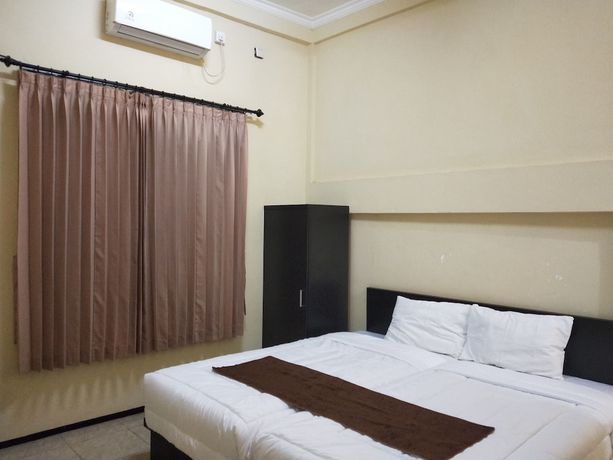 Imagen de la habitación del Hotel OYO 92655 Gian Homestay. Foto 5