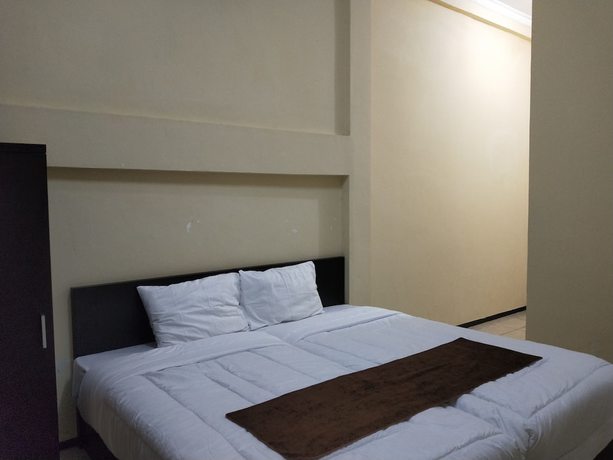 Imagen de la habitación del Hotel OYO 92655 Gian Homestay. Foto 12