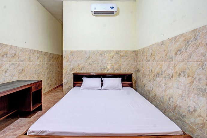 Imagen de la habitación del Hotel OYO 92655 Gian Homestay. Foto 14