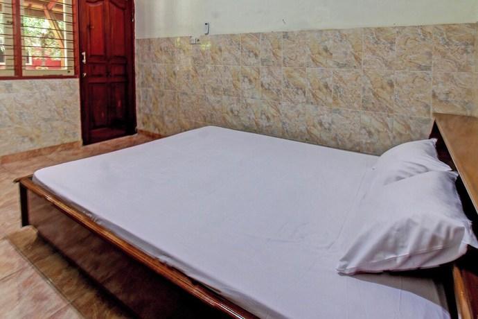 Imagen de la habitación del Hotel OYO 92655 Gian Homestay. Foto 16