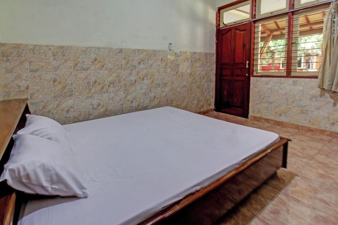 Imagen de la habitación del Hotel OYO 92655 Gian Homestay. Foto 18