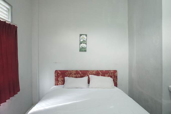 Imagen de la habitación del Hotel OYO 92659 Wisma Deli Syariah. Foto 4