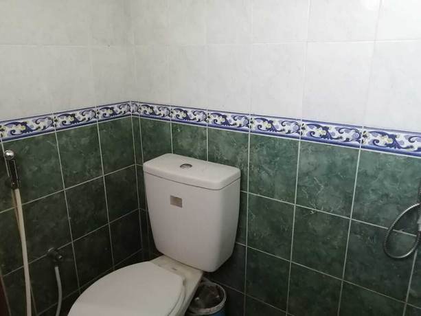 Imagen de la habitación del Hotel OYO 92659 Wisma Deli Syariah. Foto 6