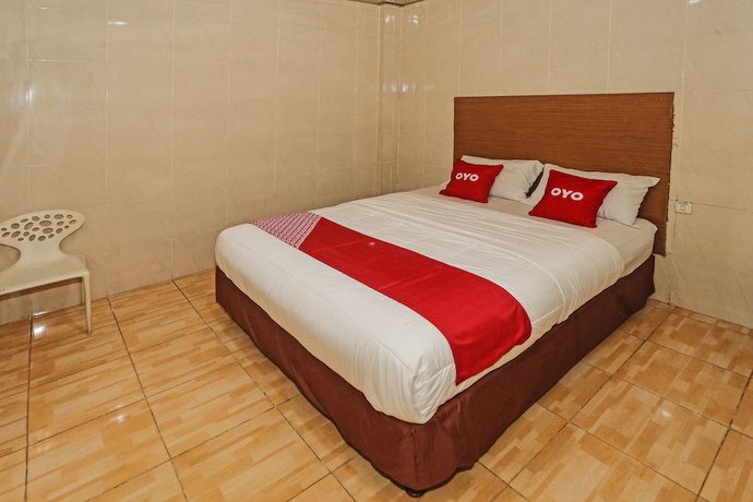 Imagen de la habitación del Hotel OYO 92674 Ciputat. Foto 13
