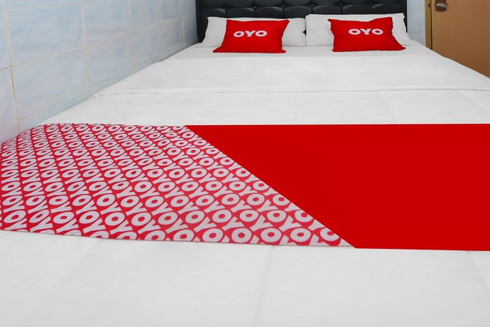 Imagen de la habitación del Hotel OYO 92677 Bintaro. Foto 3