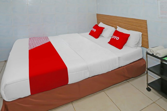 Imagen de la habitación del Hotel OYO 92677 Bintaro. Foto 5