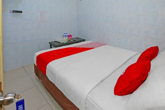 Imagen de la habitación del Hotel OYO 92677 Bintaro. Foto 6