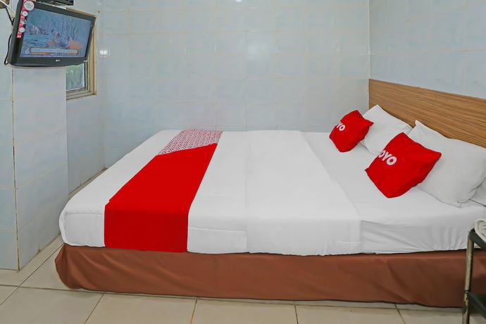 Imagen de la habitación del Hotel OYO 92677 Bintaro. Foto 10