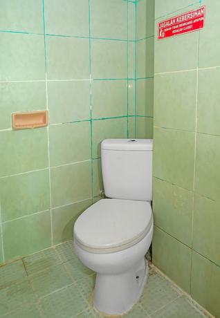 Imagen de la habitación del Hotel OYO 92677 Bintaro. Foto 11