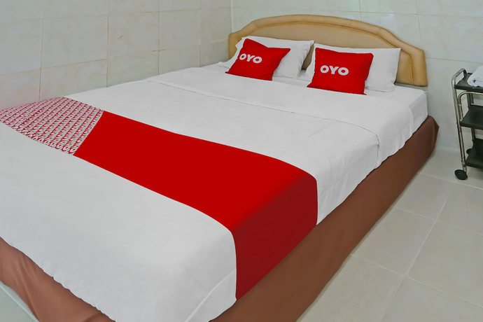 Imagen de la habitación del Hotel OYO 92677 Bintaro. Foto 14