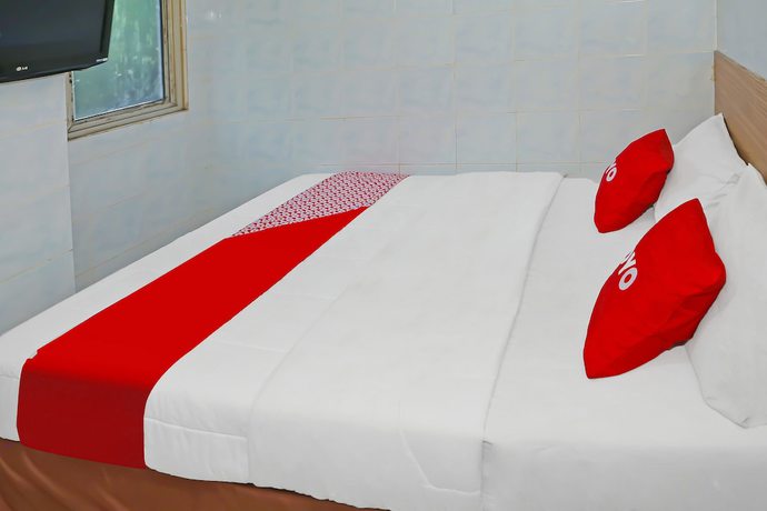 Imagen de la habitación del Hotel OYO 92677 Bintaro. Foto 15