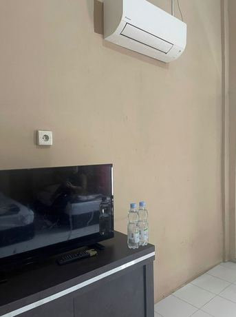 Imagen de la habitación del Hotel OYO 92696 Bahagia Homestay Syariah. Foto 8