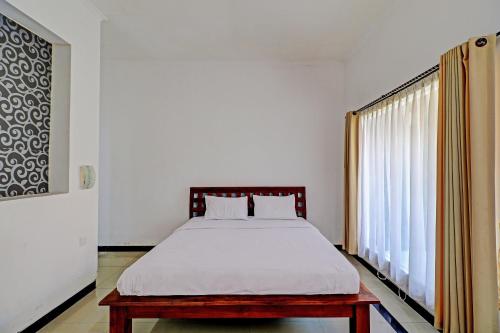 Imagen de la habitación del Hotel OYO 92706 Nadia Pansion. Foto 20