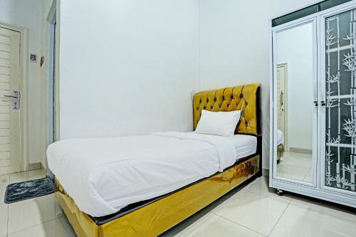 Imagen de la habitación del Hotel OYO 92708 Mufasa Syariah. Foto 19