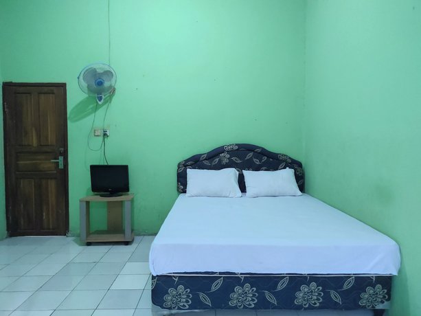 Imagen de la habitación del Hotel OYO 92724 Penginapan Syariah Al Syifa. Foto 2