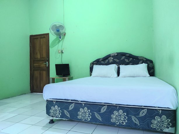 Imagen de la habitación del Hotel OYO 92724 Penginapan Syariah Al Syifa. Foto 3