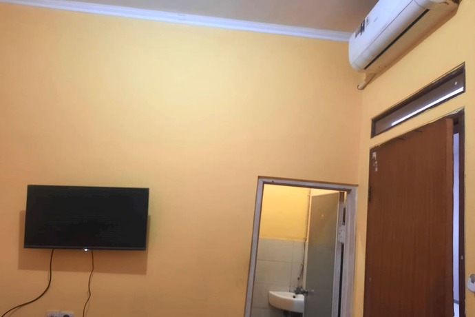 Imagen de la habitación del Hotel OYO 92725 Regol Srimahi Residence. Foto 10