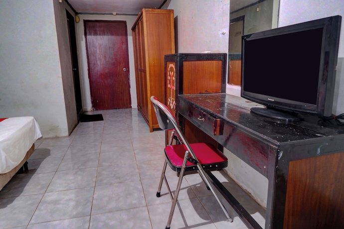 Imagen de la habitación del Hotel OYO 92748 Tepian Batang Hari. Foto 13