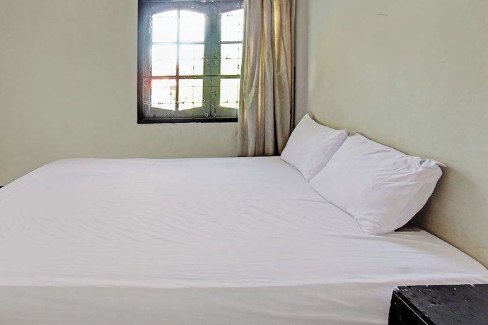 Imagen de la habitación del Hotel OYO 92750 Motel Langko. Foto 2