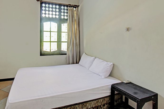 Imagen de la habitación del Hotel OYO 92750 Motel Langko. Foto 3