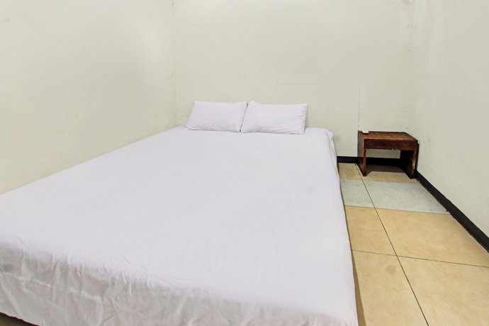 Imagen de la habitación del Hotel OYO 92750 Motel Langko. Foto 4