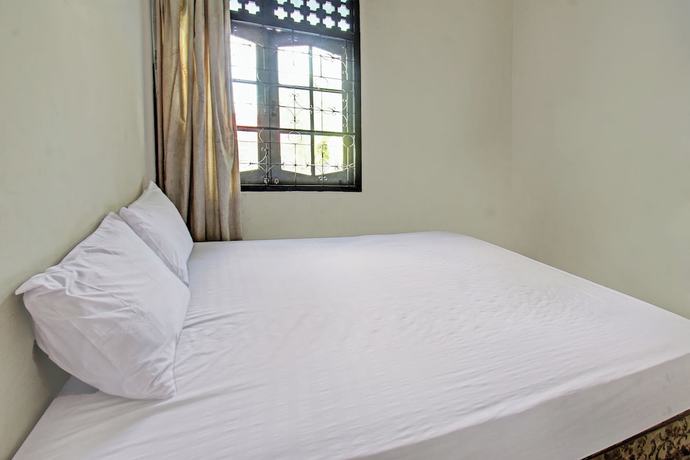 Imagen de la habitación del Hotel OYO 92750 Motel Langko. Foto 5