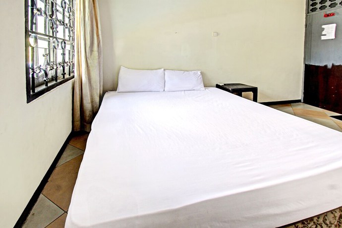Imagen de la habitación del Hotel OYO 92750 Motel Langko. Foto 6