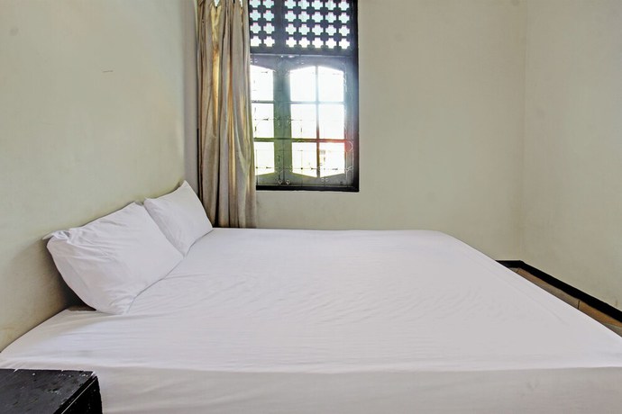 Imagen de la habitación del Hotel OYO 92750 Motel Langko. Foto 7