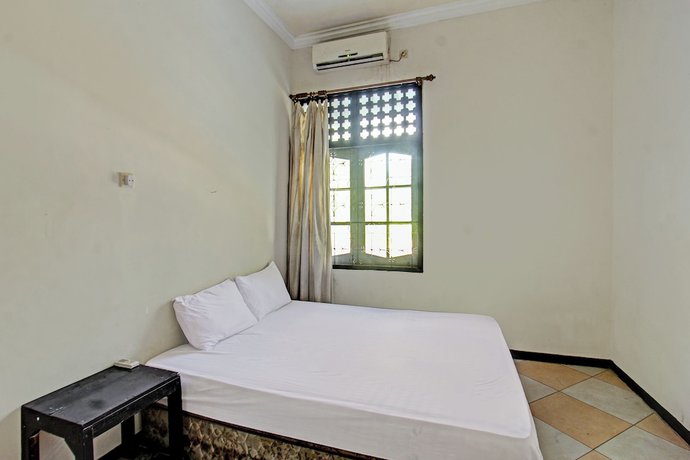 Imagen de la habitación del Hotel OYO 92750 Motel Langko. Foto 8