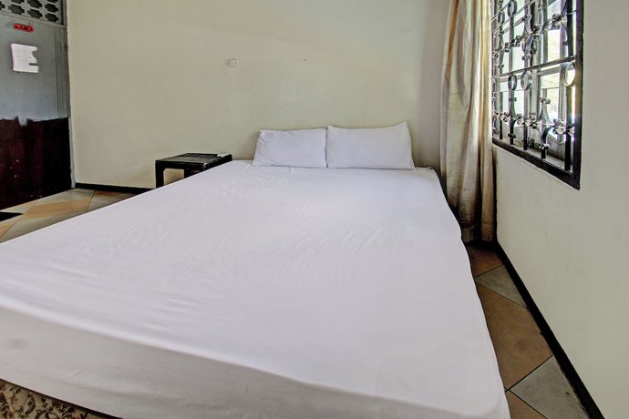 Imagen de la habitación del Hotel OYO 92750 Motel Langko. Foto 9