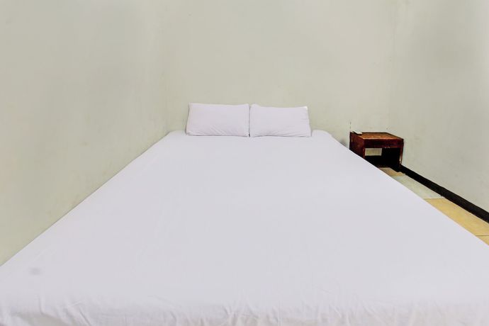 Imagen de la habitación del Hotel OYO 92750 Motel Langko. Foto 10