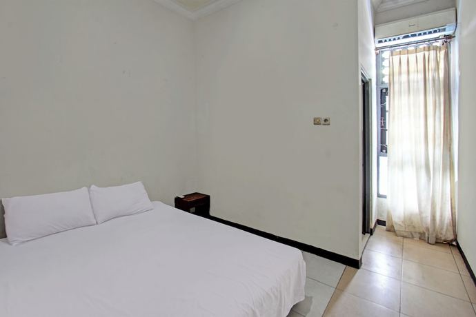 Imagen de la habitación del Hotel OYO 92750 Motel Langko. Foto 11