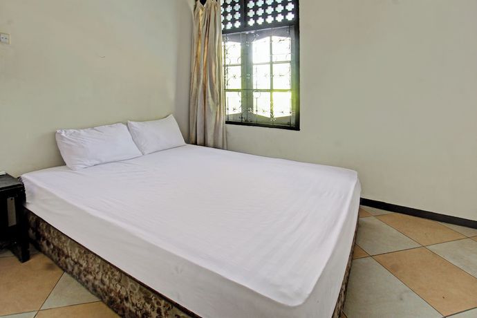 Imagen de la habitación del Hotel OYO 92750 Motel Langko. Foto 12