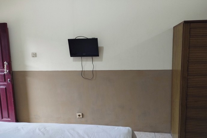 Imagen de la habitación del Hotel OYO 92756 Kos Moncok. Foto 4