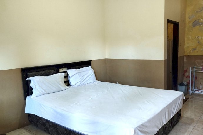 Imagen de la habitación del Hotel OYO 92756 Kos Moncok. Foto 6